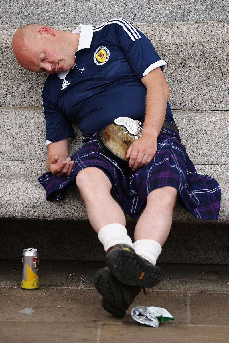 Illustration for article titled A Photo Tribute To Drunk Scottish Fans